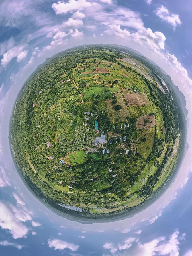 Nivadoo Resort Sigiriya Exterior photo Aerial view of the village