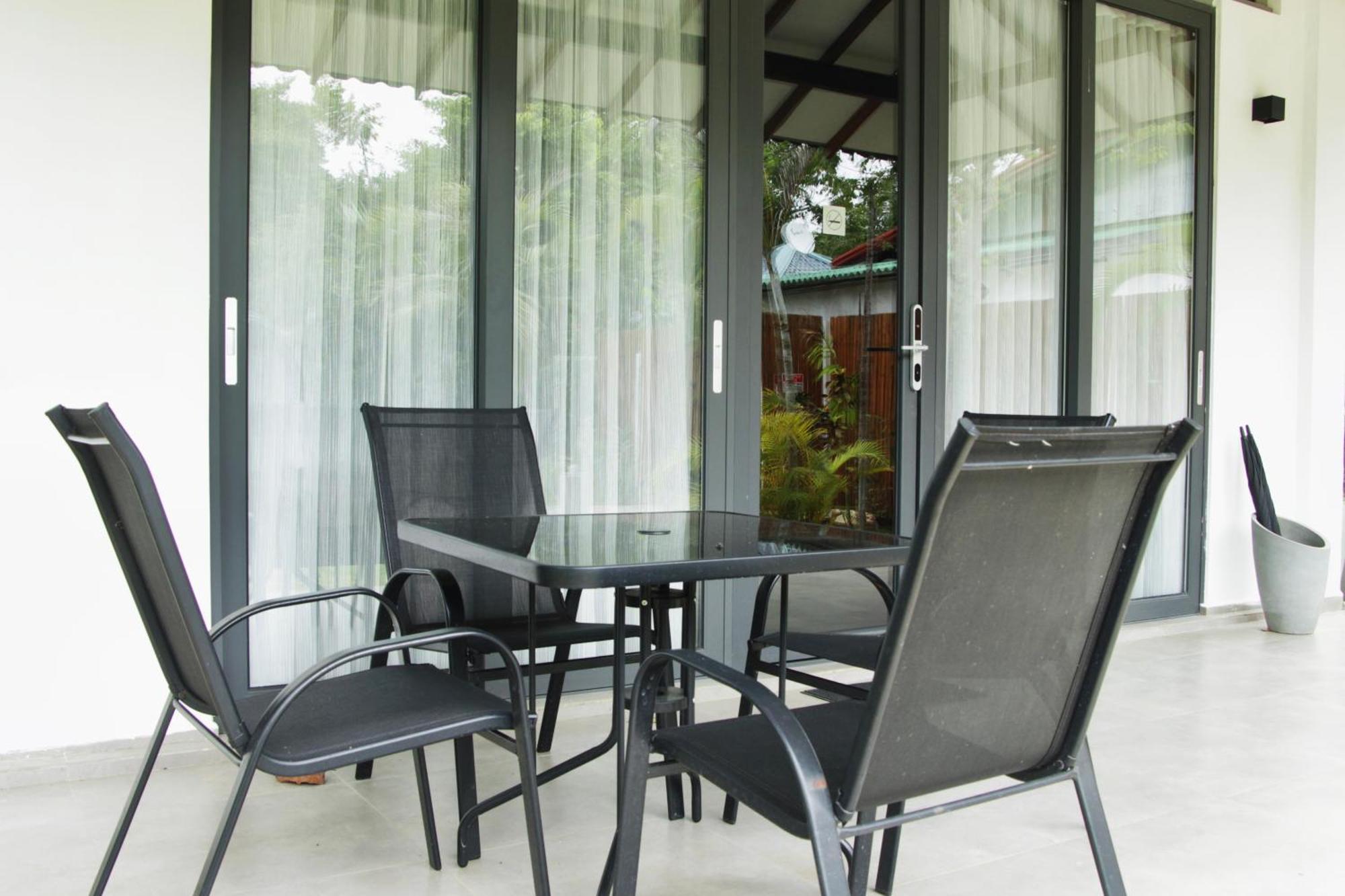 Nivadoo Resort Sigiriya Room photo A set of patio furniture